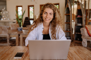 woman texting Life Coaching and Therapy